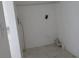 Simple laundry room with space for washer and dryer hookups at 1073 Marcus St, Port Charlotte, FL 33952