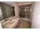 Bathroom with shower/tub combo, sink, and toilet at 1125 Hinton St, Port Charlotte, FL 33952