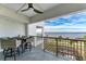 Enjoy breathtaking water views from this condo balcony with comfortable seating and stylish railings at 1425 Park Beach Cir # 149, Punta Gorda, FL 33950