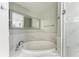 Close up on a modern bathroom featuring a soaking tub and a glass shower at 1425 Park Beach Cir # 149, Punta Gorda, FL 33950