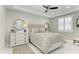Serene bedroom with decorative mirrors, soft lighting, and a comfortable bed with patterned linens at 1425 Park Beach Cir # 149, Punta Gorda, FL 33950