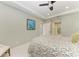 Calm bedroom includes a view of a bathroom, soothing colors, and stylish patterns, creating a restful retreat at 1425 Park Beach Cir # 149, Punta Gorda, FL 33950