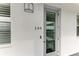 A welcoming entrance featuring a modern door and contemporary design, enhancing the curb appeal of the residence at 1425 Park Beach Cir # 149, Punta Gorda, FL 33950