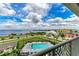 Enjoy stunning water views from the community pool and spa, surrounded by lush landscaping and seating at 1425 Park Beach Cir # 149, Punta Gorda, FL 33950