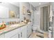 Clean bathroom with granite countertop and tub at 15292 Mille Fiore Blvd, Port Charlotte, FL 33953