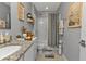 Well-appointed bathroom with granite vanity and shower at 15292 Mille Fiore Blvd, Port Charlotte, FL 33953