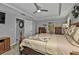 Well-lit bedroom with ensuite access and a king-size bed at 15292 Mille Fiore Blvd, Port Charlotte, FL 33953