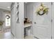 Inviting entryway with coffee bar and storage at 15292 Mille Fiore Blvd, Port Charlotte, FL 33953