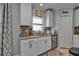 Kitchen features granite counters and a sink at 15292 Mille Fiore Blvd, Port Charlotte, FL 33953