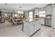 Modern kitchen with an island and stainless steel appliances at 15292 Mille Fiore Blvd, Port Charlotte, FL 33953