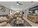 Open concept living room with a view into the kitchen at 15292 Mille Fiore Blvd, Port Charlotte, FL 33953