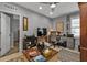 Bright home office with built-in cabinet and desk at 15292 Mille Fiore Blvd, Port Charlotte, FL 33953