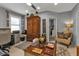 Functional home office with desk, seating, and storage at 15292 Mille Fiore Blvd, Port Charlotte, FL 33953