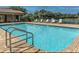 Inviting community pool with lounge chairs and a clear view at 15292 Mille Fiore Blvd, Port Charlotte, FL 33953