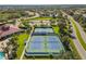 Community tennis courts with surrounding landscaping at 1656 Hyssop Loop, North Port, FL 34289