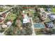 Aerial view of property with large lot and tennis courts at 1931 Bayshore Dr, Englewood, FL 34223