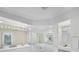 Large bathroom with corner tub and double vanity at 1931 Bayshore Dr, Englewood, FL 34223