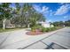 House exterior view, spacious lot with gazebo and palm trees at 1931 Bayshore Dr, Englewood, FL 34223