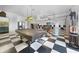 Game room with pool table, arcade games, and checkerboard floor at 1931 Bayshore Dr, Englewood, FL 34223