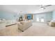 Spacious main bedroom with sitting area and access to backyard at 1931 Bayshore Dr, Englewood, FL 34223