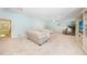 Bright main bedroom with sitting area and access to backyard at 1931 Bayshore Dr, Englewood, FL 34223