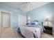 Guest bedroom with double bed and ensuite bathroom access at 2427 Daisy Dr, North Port, FL 34289