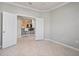 Bright bonus room with tile floors and access to kitchen at 2427 Daisy Dr, North Port, FL 34289