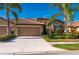 Charming home featuring a well-manicured lawn, beautiful landscaping, and a tile roof at 2427 Daisy Dr, North Port, FL 34289