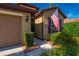 Landscaped front yard with walkway to house entrance at 2427 Daisy Dr, North Port, FL 34289