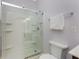 Bathroom with a large shower and modern fixtures at 24490 Wallaby Ln, Punta Gorda, FL 33955
