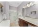 Clean bathroom with a shower/tub combo and updated vanity at 24490 Wallaby Ln, Punta Gorda, FL 33955