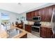 Kitchen with stainless steel appliances and granite counters at 24490 Wallaby Ln, Punta Gorda, FL 33955