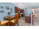 Bright kitchen features a breakfast nook and an island at 24490 Wallaby Ln, Punta Gorda, FL 33955