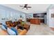 Kitchen with light blue walls, hardwood floors, and a center island at 24490 Wallaby Ln, Punta Gorda, FL 33955