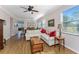 Bright living room with hardwood floors and comfortable seating at 24490 Wallaby Ln, Punta Gorda, FL 33955