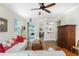 Open living area with hardwood floors and view of the front entry at 24490 Wallaby Ln, Punta Gorda, FL 33955