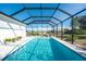 Enjoy this refreshing screened pool with open views at 24490 Wallaby Ln, Punta Gorda, FL 33955