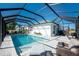 Inviting screened pool and patio area, perfect for outdoor living at 24490 Wallaby Ln, Punta Gorda, FL 33955