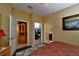 Bedroom with walk-in closet and ensuite access at 2542 Oswego Dr, North Port, FL 34289