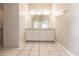 Clean bathroom with vanity and large mirror at 3800 Acline Rd, Punta Gorda, FL 33950
