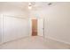 Bedroom with closet and access to hallway at 3800 Acline Rd, Punta Gorda, FL 33950