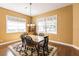 Charming dining room with wood floors and a window seat at 3800 Acline Rd, Punta Gorda, FL 33950