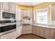 Spacious kitchen featuring granite countertops and stainless steel appliances at 3800 Acline Rd, Punta Gorda, FL 33950