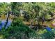 Serene waterfront view with lush vegetation at 3800 Acline Rd, Punta Gorda, FL 33950