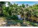 View of a calm waterway surrounded by trees at 3800 Acline Rd, Punta Gorda, FL 33950