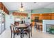 Inviting breakfast nook featuring views of the lanai and well-equipped kitchen at 3818 Bordeaux Dr, Punta Gorda, FL 33950