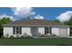 One-story home with a gray roof, white walls, and a two-car garage at 4755 Gillot Blvd, Port Charlotte, FL 33981