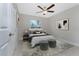Bright bedroom with a large rug and stylish furniture at 5587 E Price Blvd, North Port, FL 34288