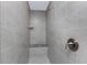 Modern bathroom features a tiled shower with a built-in bench and sleek fixtures at 5587 E Price Blvd, North Port, FL 34288