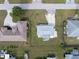Directly above view of single Gathering home and surrounding yards at 817 E 6Th St, Englewood, FL 34223